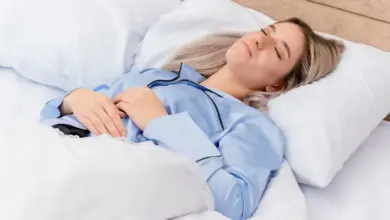 Melhor posição para dormir com dor na lombar